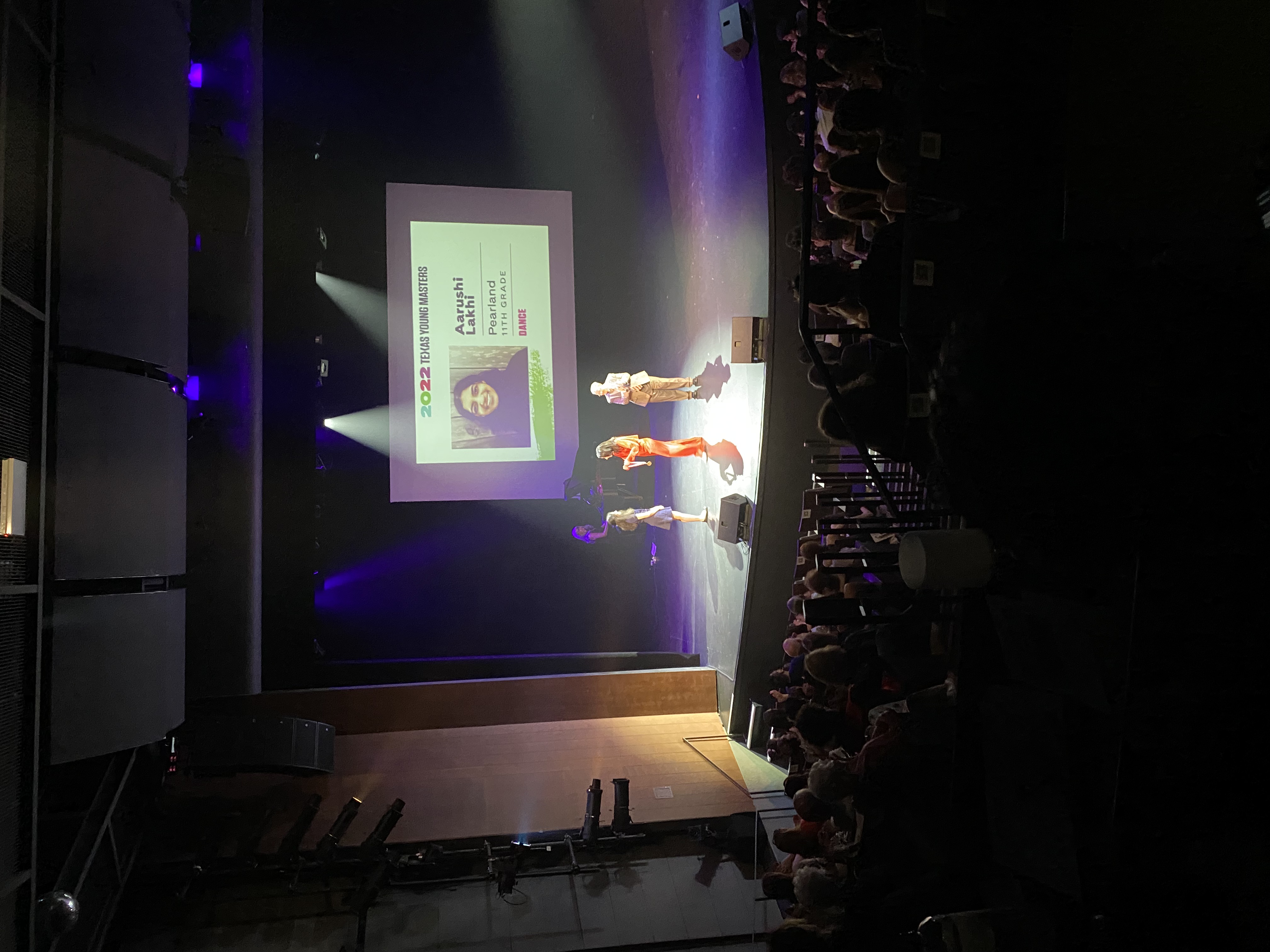 Aarushi Lakhi receiving the Texas Young Masters medal at Zach Theater