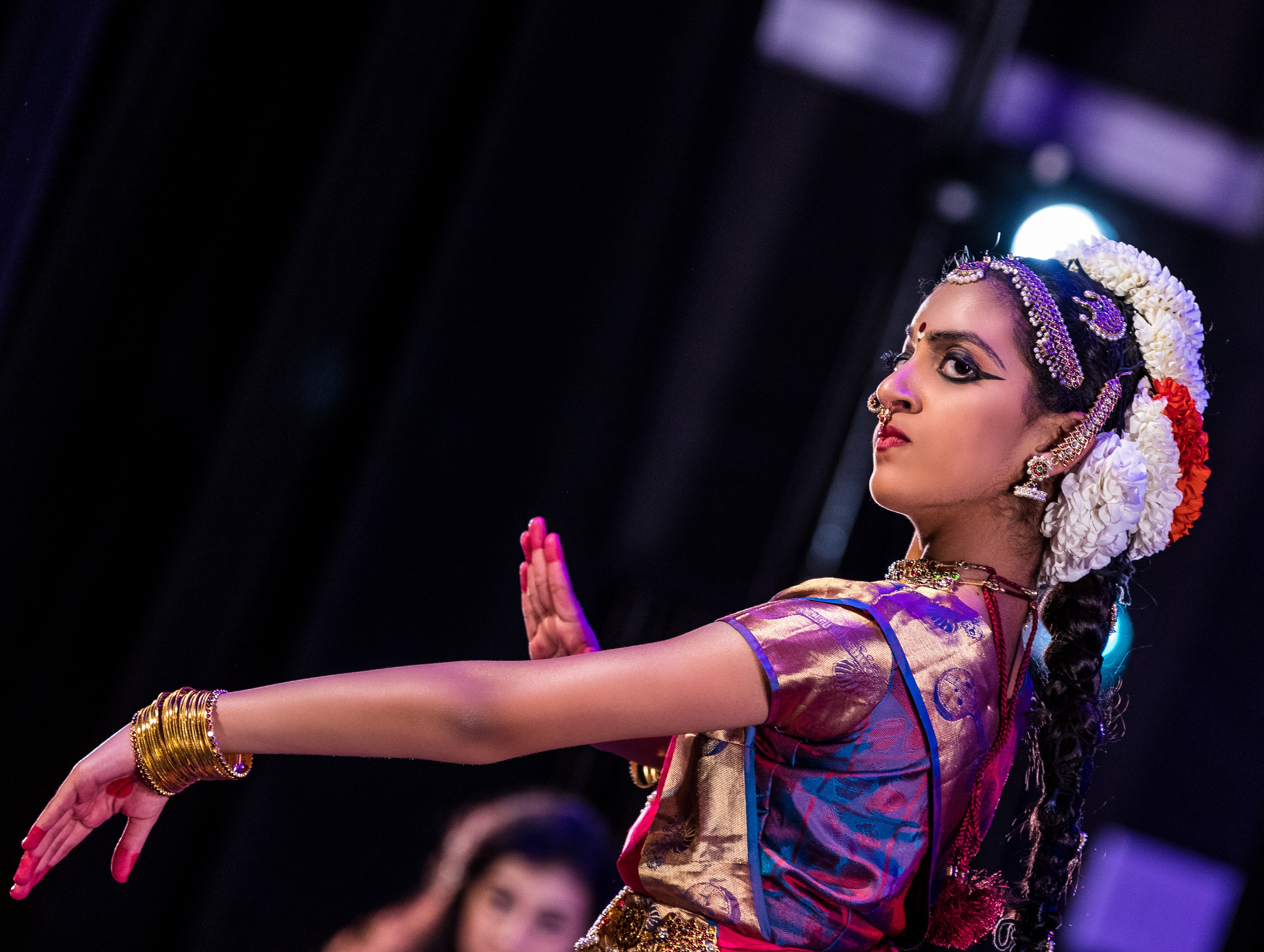 Aarushi Lakhi depicting Shiva in a pink and blue Bharatanatyam costume