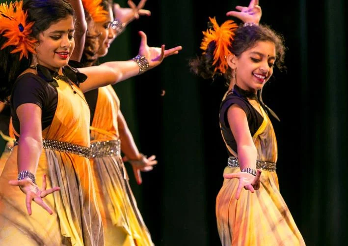 Aarushi and Maitrie as fairies in Silambam Houston's production Maya